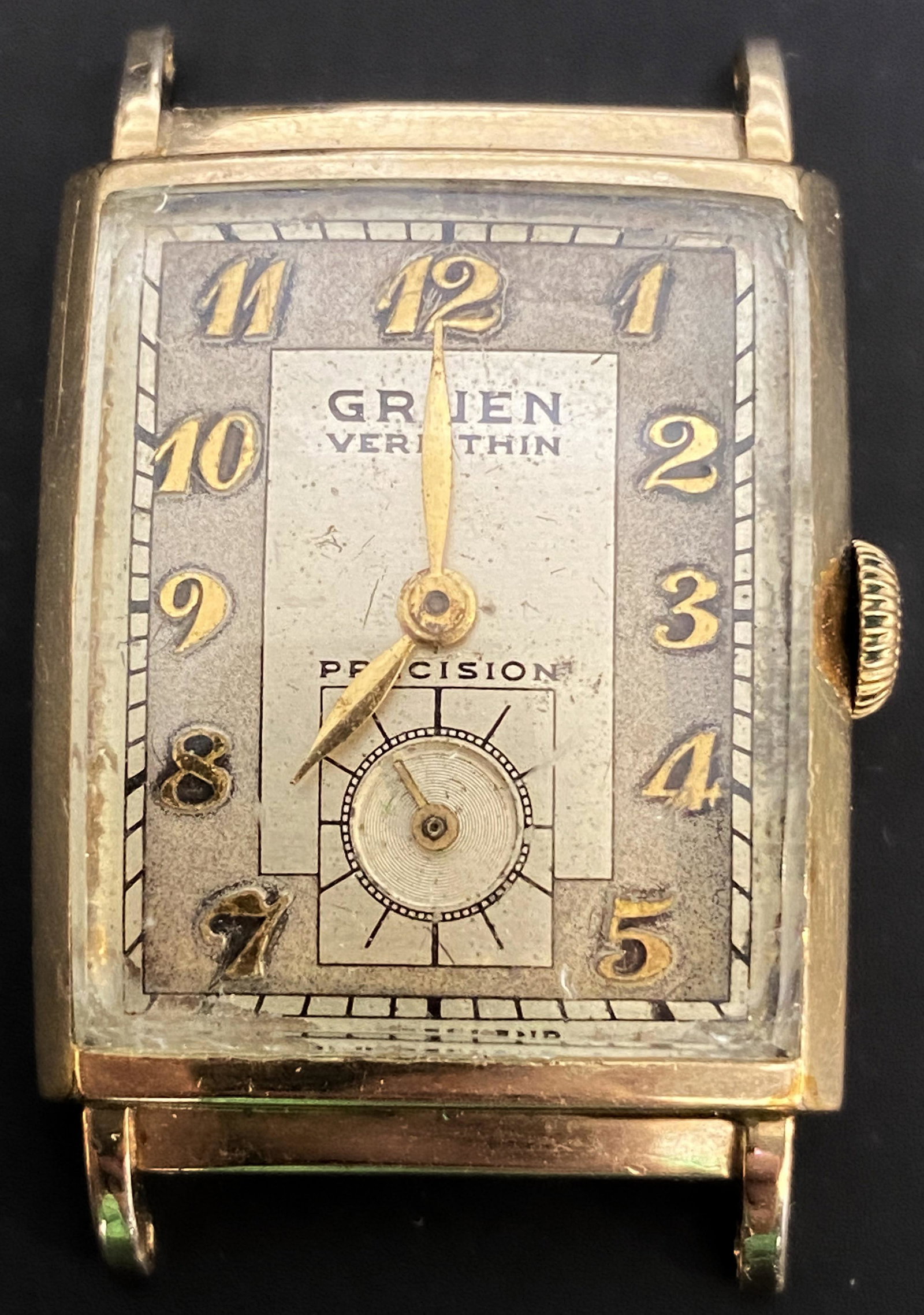 VINTAGE GRUEN VERI-THIN PRECISION GOLD FILLED WIND-UP MEN'S WATCH: VINTAGE GRUEN VERI-THIN PRECISION GOLD FILLED WIND-UP MEN'S WATCH The watch is pre-owned and runs. Diameter: 22mm (without the crown) *We can't garantee that the watch keeps accurate time, it wasn't t