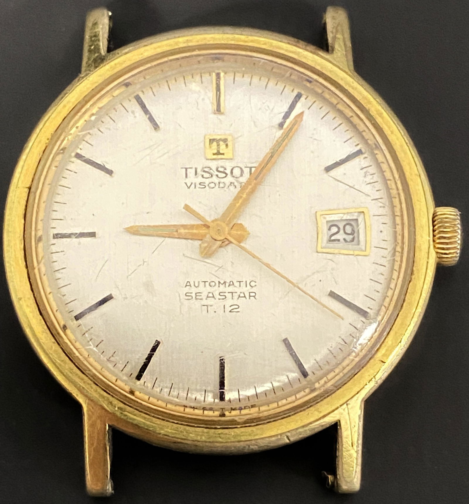 VINTAGE TISSOT VISODATE SEASTAR T. 12 AUTOMATIC MEN'S WATCH: VINTAGE TISSOT VISODATE SEASTAR T. 12 AUTOMATIC MEN'S WATCH The watch is pre-owned and runs. Diameter: 35mm (without the crown) *We can't garantee that the watch keeps accurate time, it wasn't tested