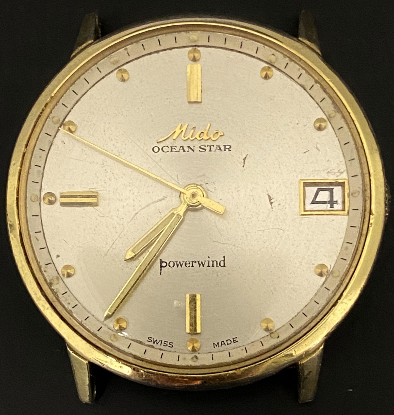 VINTAGE MIDO OCEAN STAR POWERWIND FOLD FILLED AUTOMATIC MEN'S WATCH: VINTAGE MIDO OCEAN STAR POWERWIND FOLD FILLED AUTOMATIC MEN'S WATCH The watch is pre-owned and runs. Diameter: 33mm (without the crown) *We can't garantee that the watch keeps accurate time, it wasn't