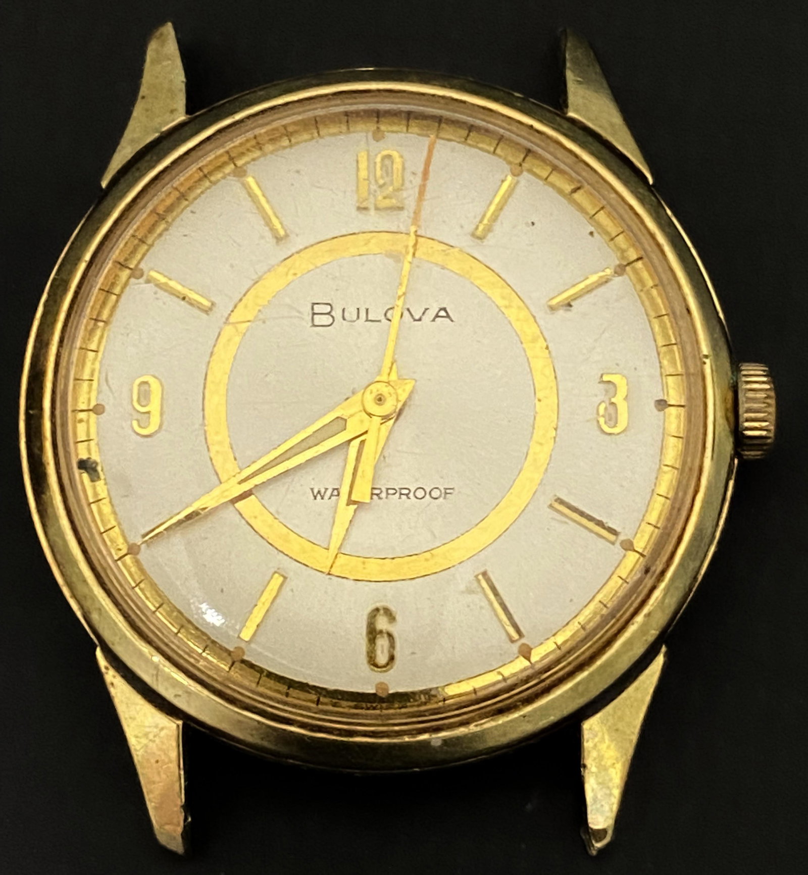 VINTAGE BULOVA GOLD FILLED WIND-UP MEN'S WATCH: VINTAGE BULOVA GOLD FILLED WIND-UP MEN'S WATCH The watch is pre-owned and runs. Diameter: 32mm (without the crown) *We can't garantee that the watch keeps accurate time, it wasn't tested long enough* 