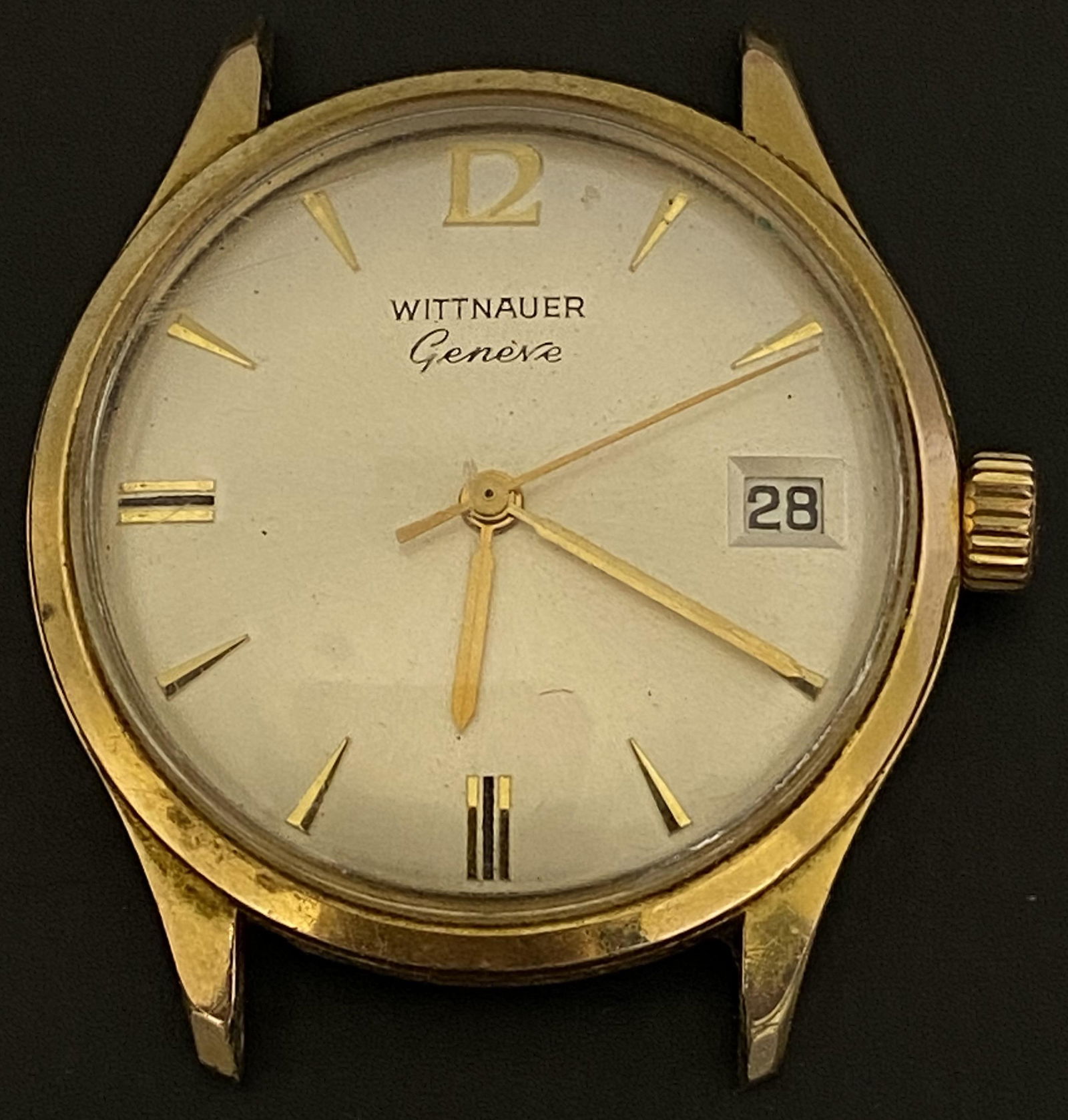 VINTAGE WITTNAUER GENÃˆVE GOLD FILLED WIND-UP MEN'S WATCH: VINTAGE WITTNAUER GENÃˆVE GOLD FILLED WIND-UP MEN'S WATCH The watch is pre-owned and runs. Diameter: 33mm (without the crown) *We can't garantee that the watch keeps accurate time, it wasn't tested