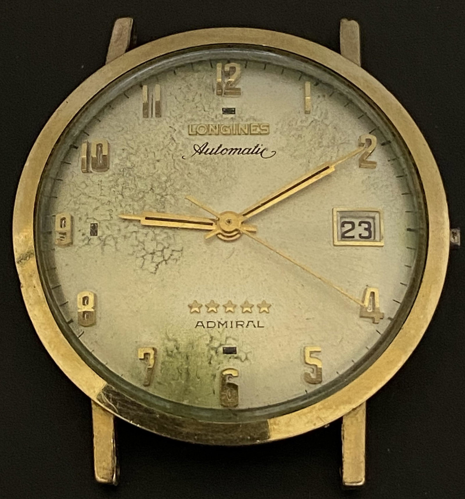 VINTAGE LONGINES ADMIRAL GOLD FILLED AUTOMATIC MEN'S WATCH: VINTAGE LONGINES ADMIRAL GOLD FILLED AUTOMATIC MEN'S WATCH The watch is pre-owned and doesn't run. Diameter: 35mm (without the crown) SHIPPING FEE CANADA 15,00$ USA 20.00$ We add 5$ by additional item