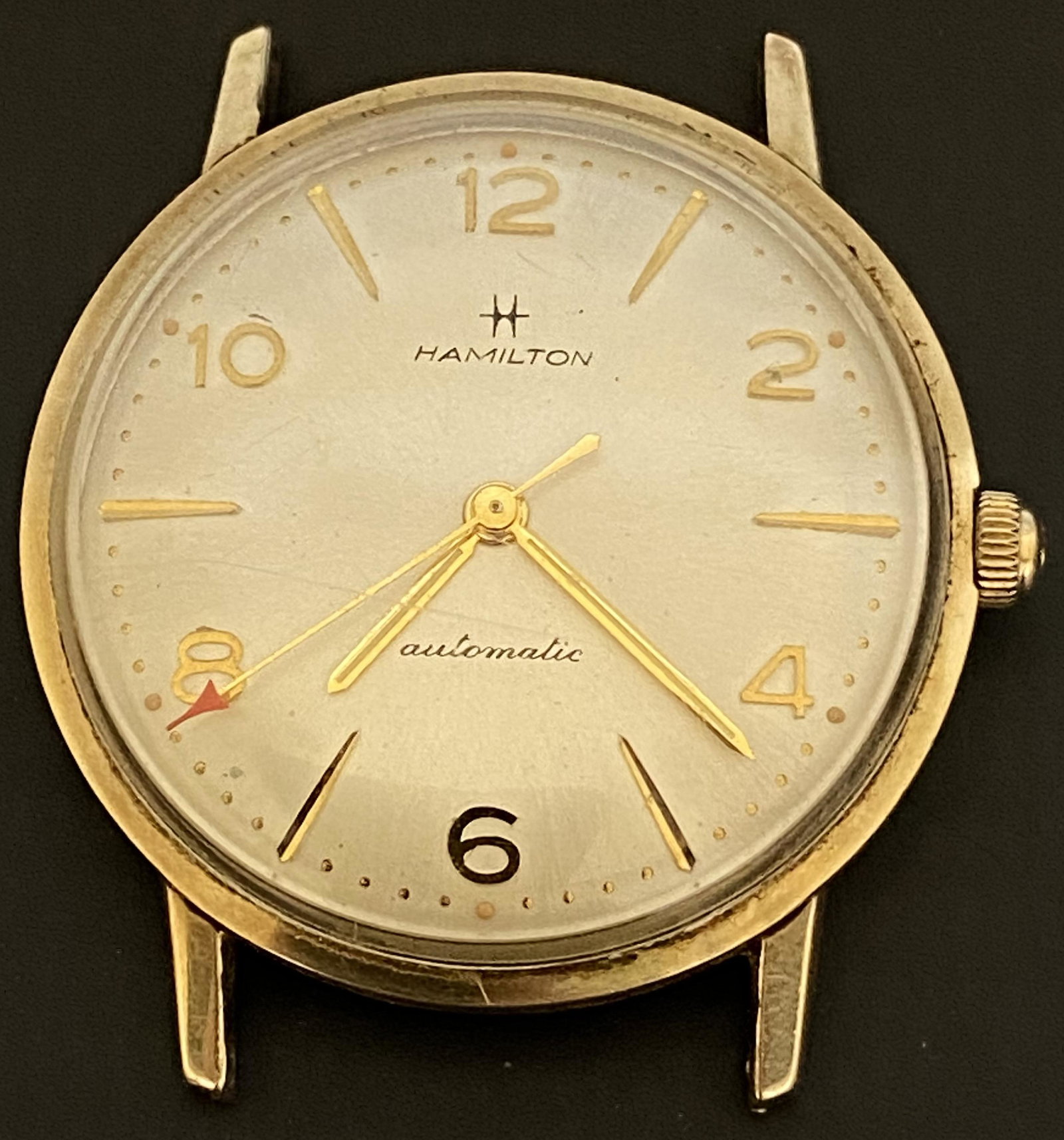 VINTAGE HAMILTON GOLD FILLED AUTOMATIC MEN'S WATCH: VINTAGE HAMILTON GOLD FILLED AUTOMATIC MEN'S WATCH The watch is pre-owned and doesn't run. Diameter: 33mm (without the crown) SHIPPING FEE CANADA 15,00$ USA 20.00$ We add 5$ by additional item