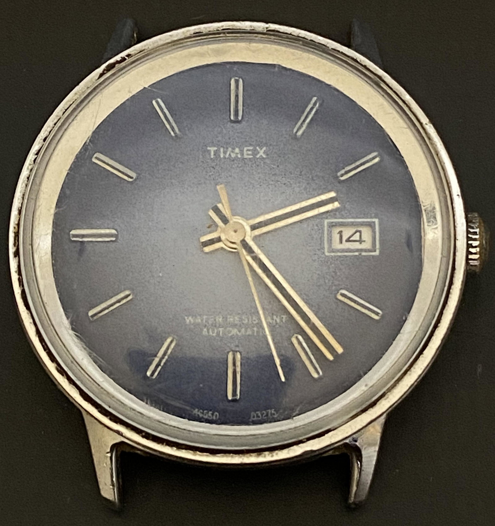 VINTAGE TIMEX 46550-03275 AUTOMATIC MEN'S WATCH: VINTAGE TIMEX 46550-03275 AUTOMATIC MEN'S WATCH The watch is pre-owned and runs. Diameter: 35mm (without the crown) *We can't garantee that the watch keeps accurate time, it wasn't tested long enough*
