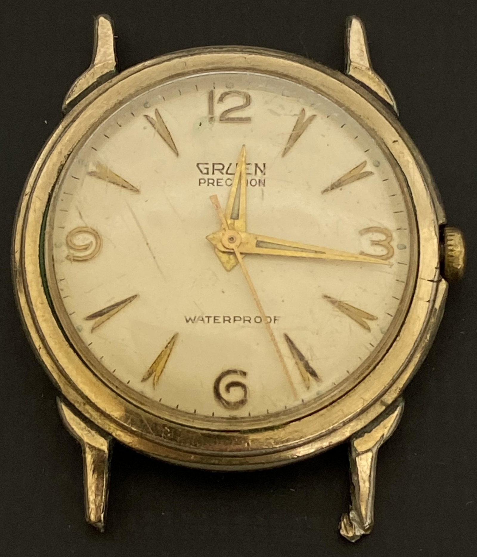 VINTAGE GRUEN GOLD FILLED WIND-UP MEN'S WATCH: VINTAGE GRUEN GOLD FILLED WIND-UP MEN'S WATCH The watch is pre-owned and doesn't run. Diameter: 33mm (without the crown) SHIPPING FEE CANADA 15,00$ USA 20.00$ We add 5$ by additional item