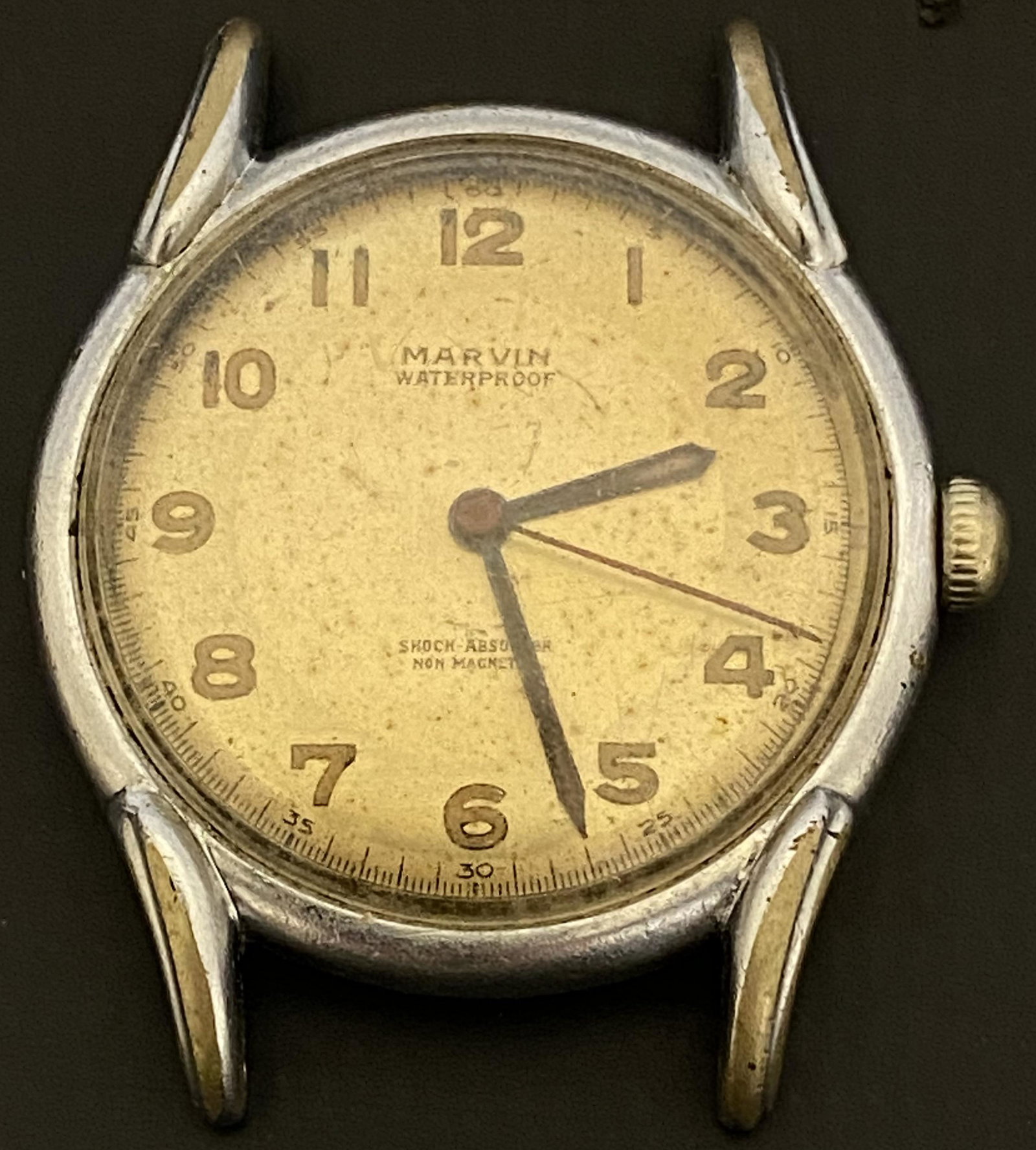 VINTAGE MARVIN WIND-UP MEN'S WATCH: VINTAGE MARVIN WIND-UP MEN'S WATCH The watch is pre-owned and doesn't run. Diameter: 32mm (without the crown) SHIPPING FEE CANADA 15,00$ USA 20.00$ We add 5$ by additional item