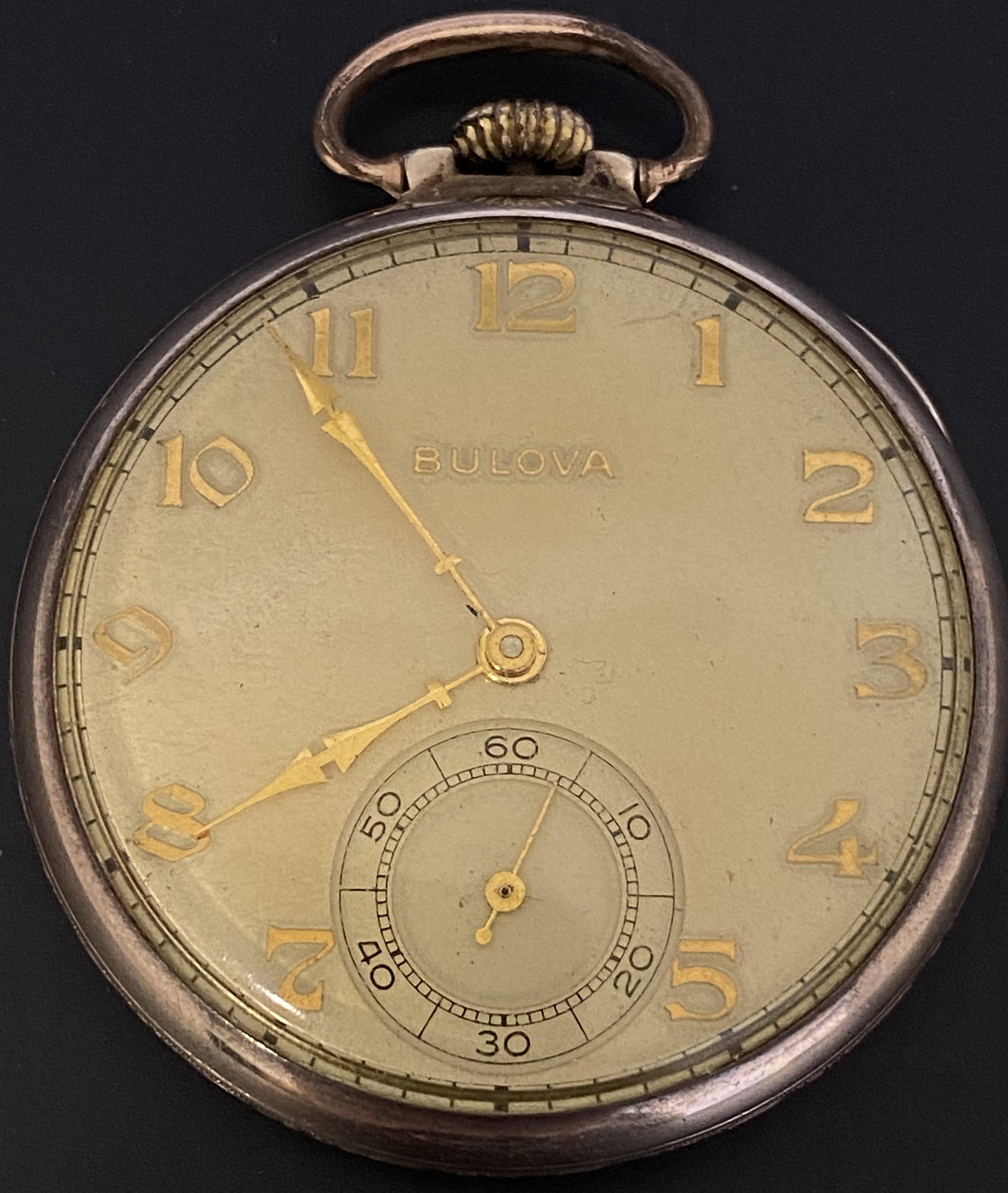 ANTIQUE BULOVA CAL.17AH GOLD FILLED POCKET WATCH: ANTIQUE BULOVA CAL.17AH GOLD FILLED POCKET WATCH The watch is pre-owned and runs. Diameter: 1 5/8 in *We can't garantee that the watch keeps accurate time, it wasn't tested long enough* SHIPPING FEE C