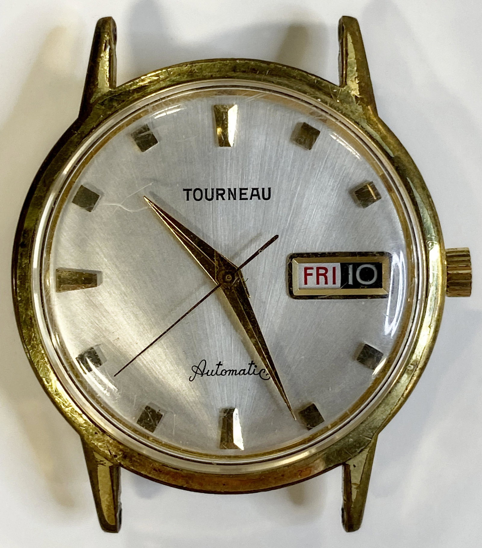 VINTAGE TOURNEAU GOLD FILLED AUTOMATIC MENS WATCH: VINTAGE TOURNEAU GOLD FILLED AUTOMATIC MENS WATCH The watch is pre-owned and runs. Diameter: 34 MM *We can't garantee that the watch keeps accurate time, it wasn't tested long enough* SHIPPING FEE CAN