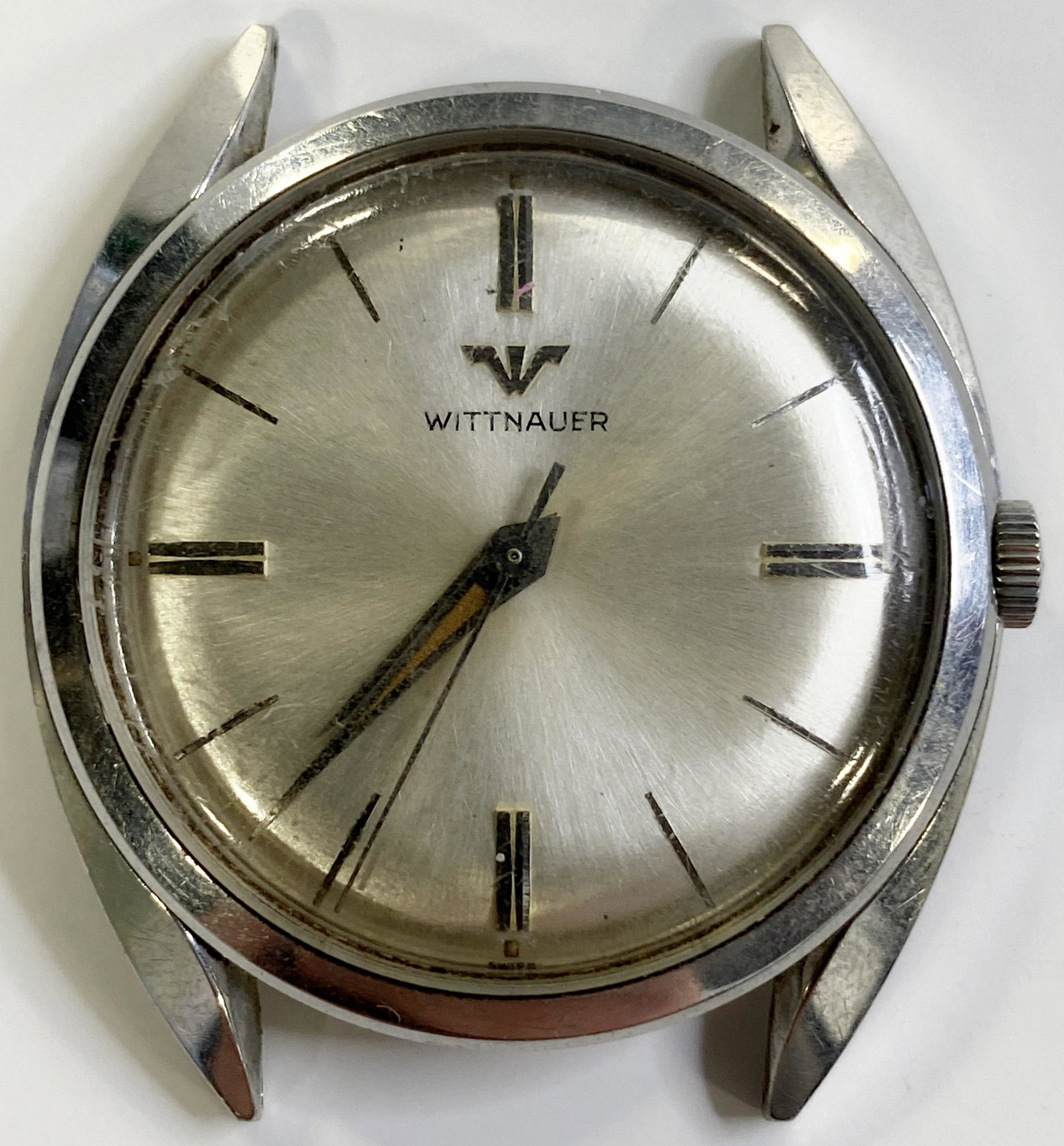 VINTAGE WITTNAUER WIND-UP MEN'S WATCH: VINTAGE WITTNAUER WIND-UP MEN'S WATCH The watch is pre-owned and doesn't run. Diameter: 34 mm SHIPPING FEE CANADA 15,00$ USA 20.00$ Combined shipping is available for an extra fee, but only on items w