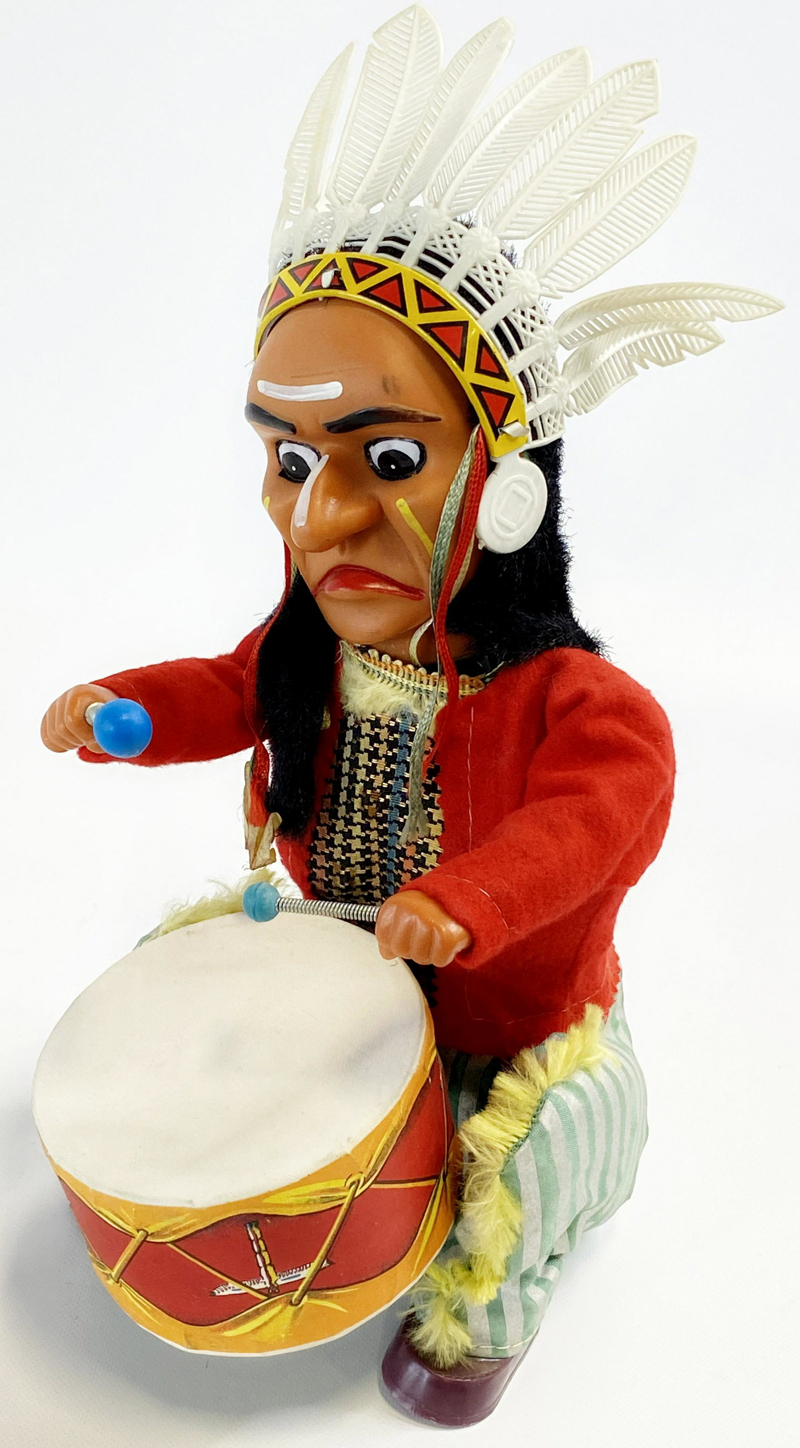 1950'S BATTERY OPERATED INDIAN CRAZY DRUMMER TIN TOY: 1950'S BATTERY OPERATED INDIAN CRAZY DRUMMER TIN TOY The toy is pre-owned and was not tested. Size : 12 inches SHIPPING FEE CANADA 20,00$ USA 25.00$ Combined shipping is available for an extra fee, b