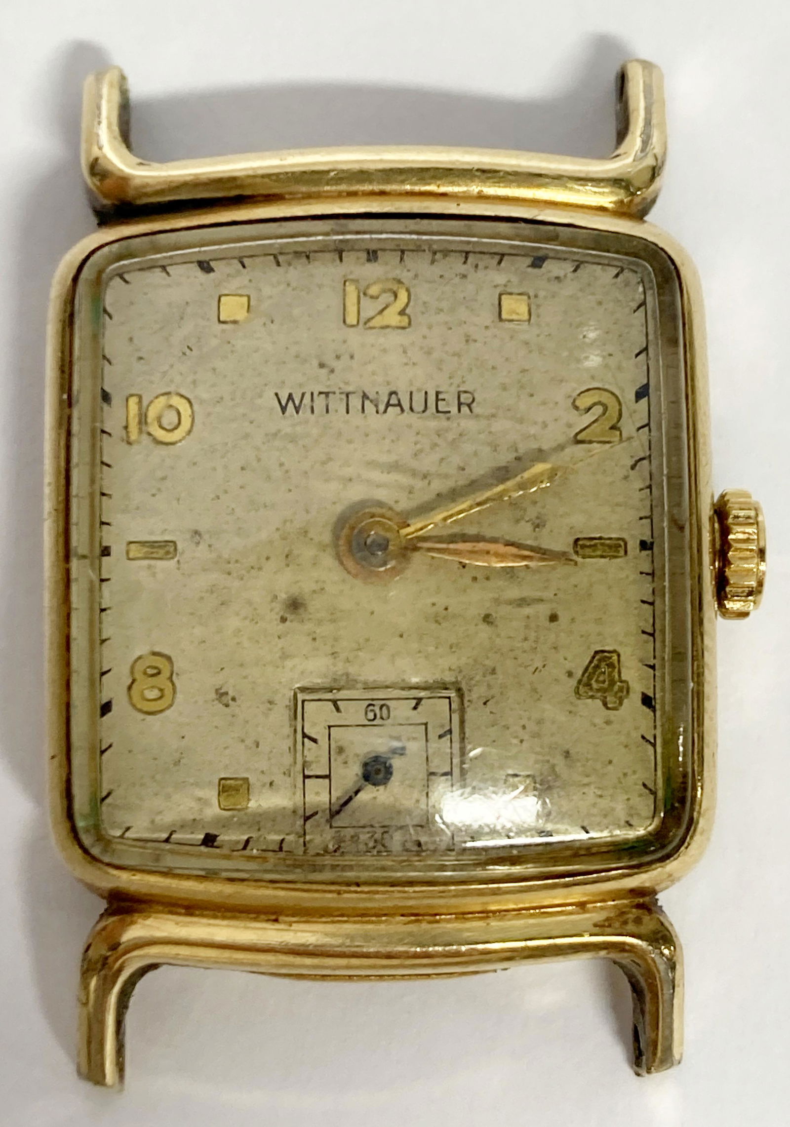 VINTAGE WITTNAUER GOLD-FILLED WIND-UP MEN'S WATCH: VINTAGE WITTNAUER GOLD-FILLED WIND-UP MEN'S WATCH The watch is pre-owned and runs. Diameter: 22 mm *We can't garantee that the watch keeps accurate time, it wasn't tested long enough* SHIPPING FEE CAN