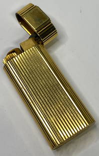 VINTAGE CARTIER LIGHTER: VINTAGE CARTIER LIGHTER The lighter is pre-owned. SHIPPING FEE CANADA 15,00$ USA 20,00$ Combined shipping is available for an extra fee, but only on items won on the same date. *All prices are in USD*