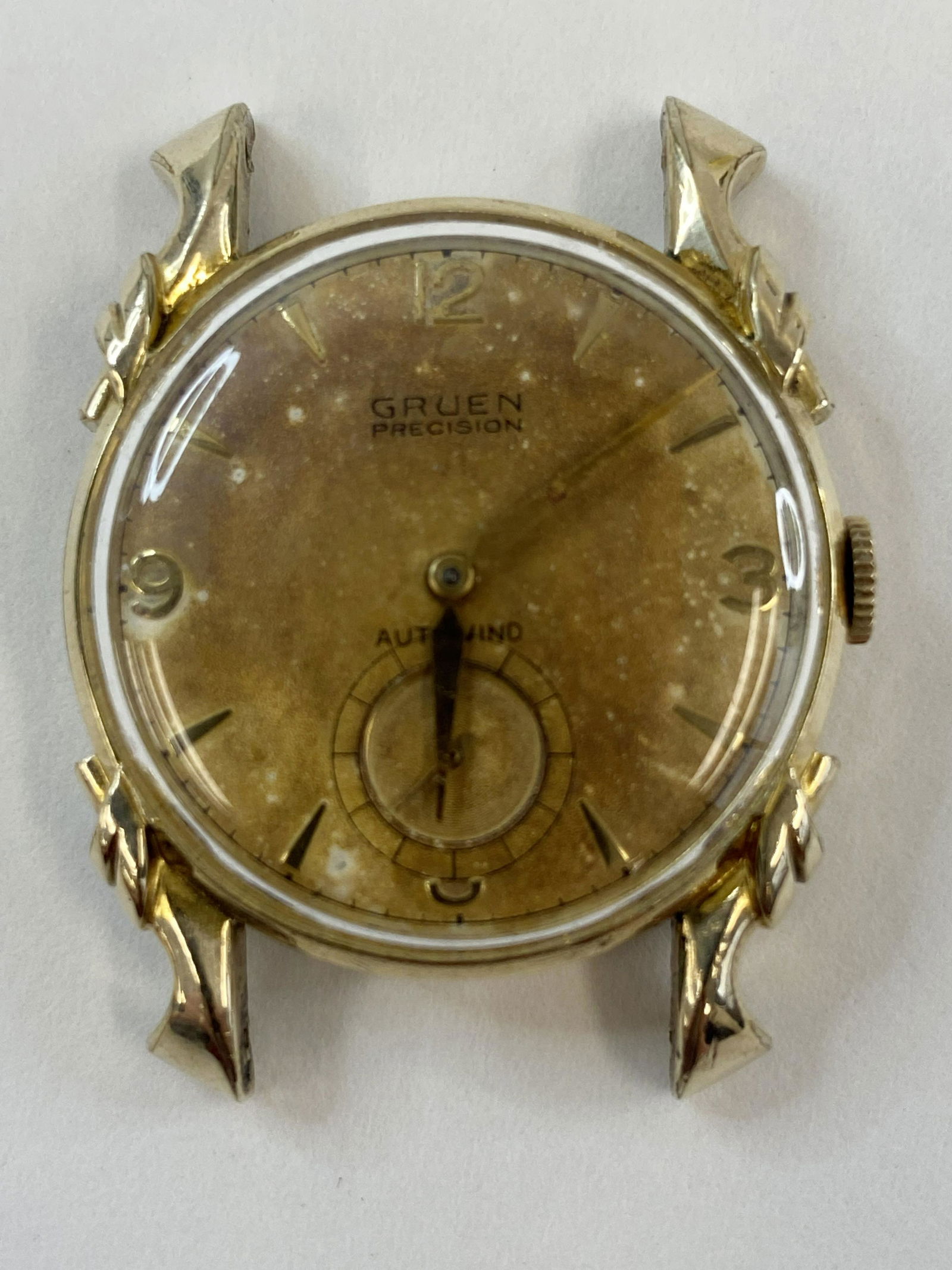 VINTAGE GRUEN GOLD-FILLED AUTOMATIC MEN'S WATCH: VINTAGE GRUEN GOLD-FILLED AUTOMATIC MEN'S WATCH The watch is pre-owned and runs. Diameter: 29 mm *We can't garantee that the watch keeps accurate time, it wasn't tested long enough* SHIPPING FEE CANAD