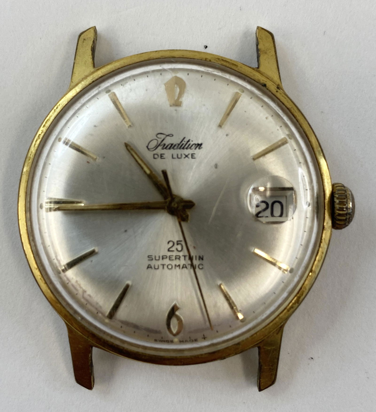 VINTAGE TRADITION GOLD-FILLED AUTOMATIC MEN'S WATCH: VINTAGE TRADITION GOLD-FILLED AUTOMATIC MEN'S WATCH The watch is pre-owned and runs. Diameter: 34 mm *We can't garantee that the watch keeps accurate time, it wasn't tested long enough* SHIPPING FEE C