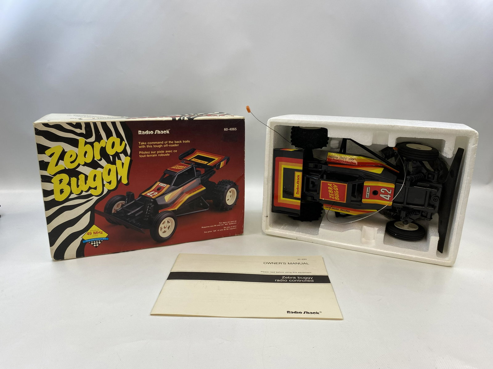 VINTAGE BATTERY OPERATED ZEBRA BUGGY TOY & BOX: VINTAGE BATTERY OPERATED ZEBRA BUGGY TOY & BOX Condition: Pre-Owned. SHIPPING FEE CANADA 15.00$ USA 20.00$ Combined shipping is available for an extra fee, but only on items won on the same date. *All