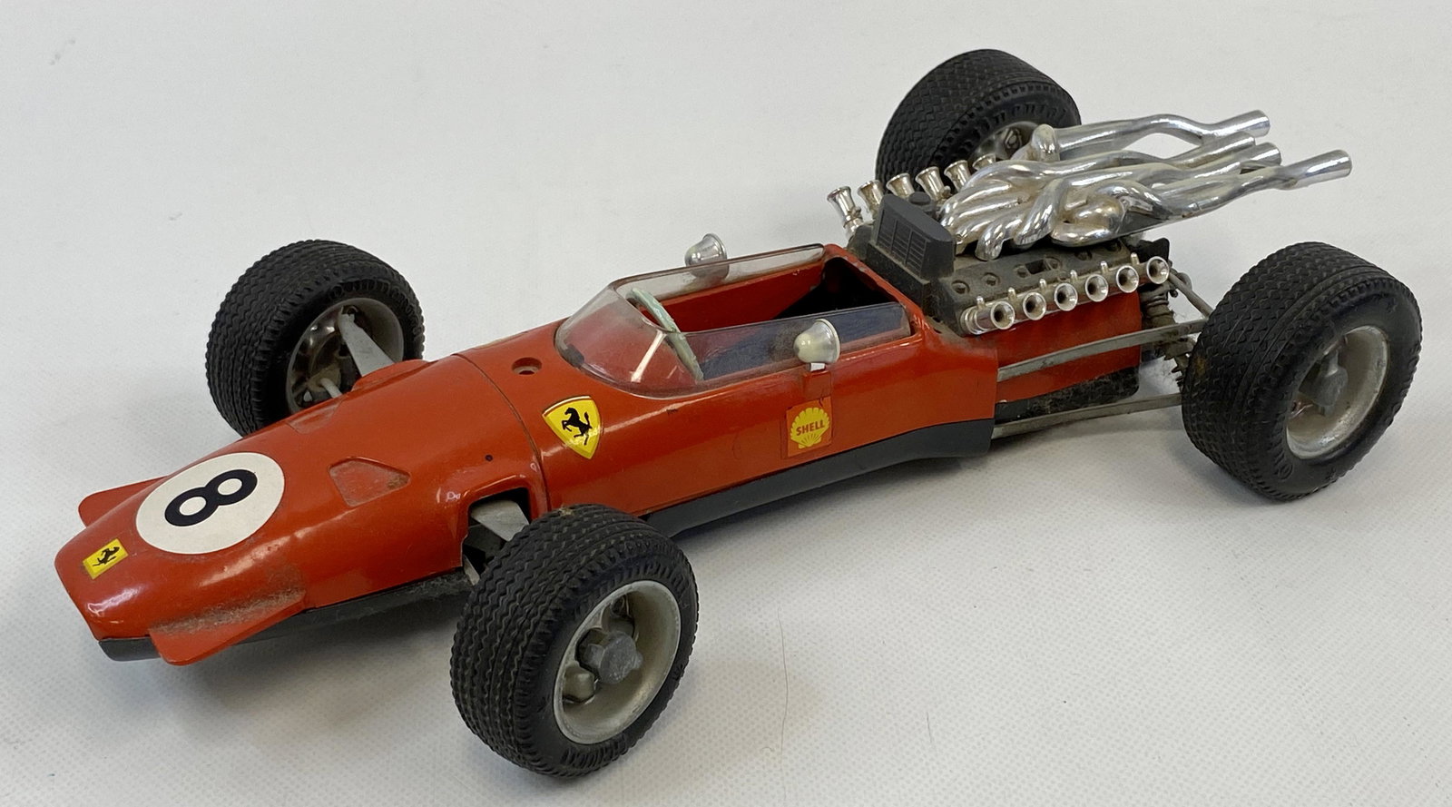 1960'S SHUCO FERRARI FORMULA 2 #1073 WIND-UP TIN TOY: 1960'S SHUCO FERRARI FORMULA 2 #1073 WIND-UP TIN TOY Condition: Pre-Owned. SIZE: 10 INCHES LONG SHIPPING FEE CANADA 15.00$ USA 20.00$ Combined shipping is available for an extra fee, but only on items