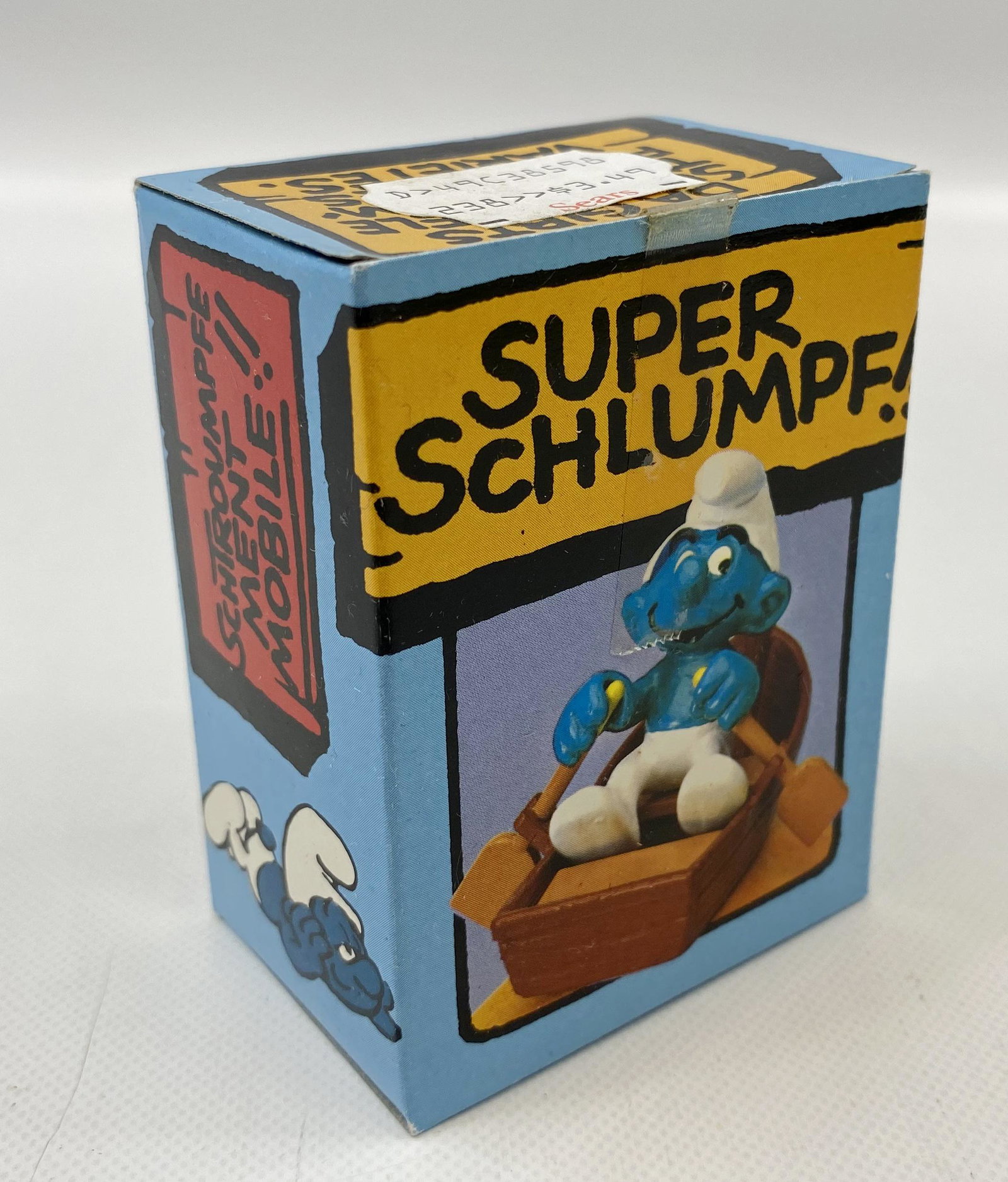 1980'S SCHLEICH PEYO SUPER SMURF WITH BOAT: 1980'S SCHLEICH PEYO SUPER SMURF WITH BOAT Condition: MINT IN BOX SEAL UNBROKEN. SHIPPING FEE CANADA 10.00$ USA 15.00$ Combined shipping is available for an extra fee, but only on items won on the sam