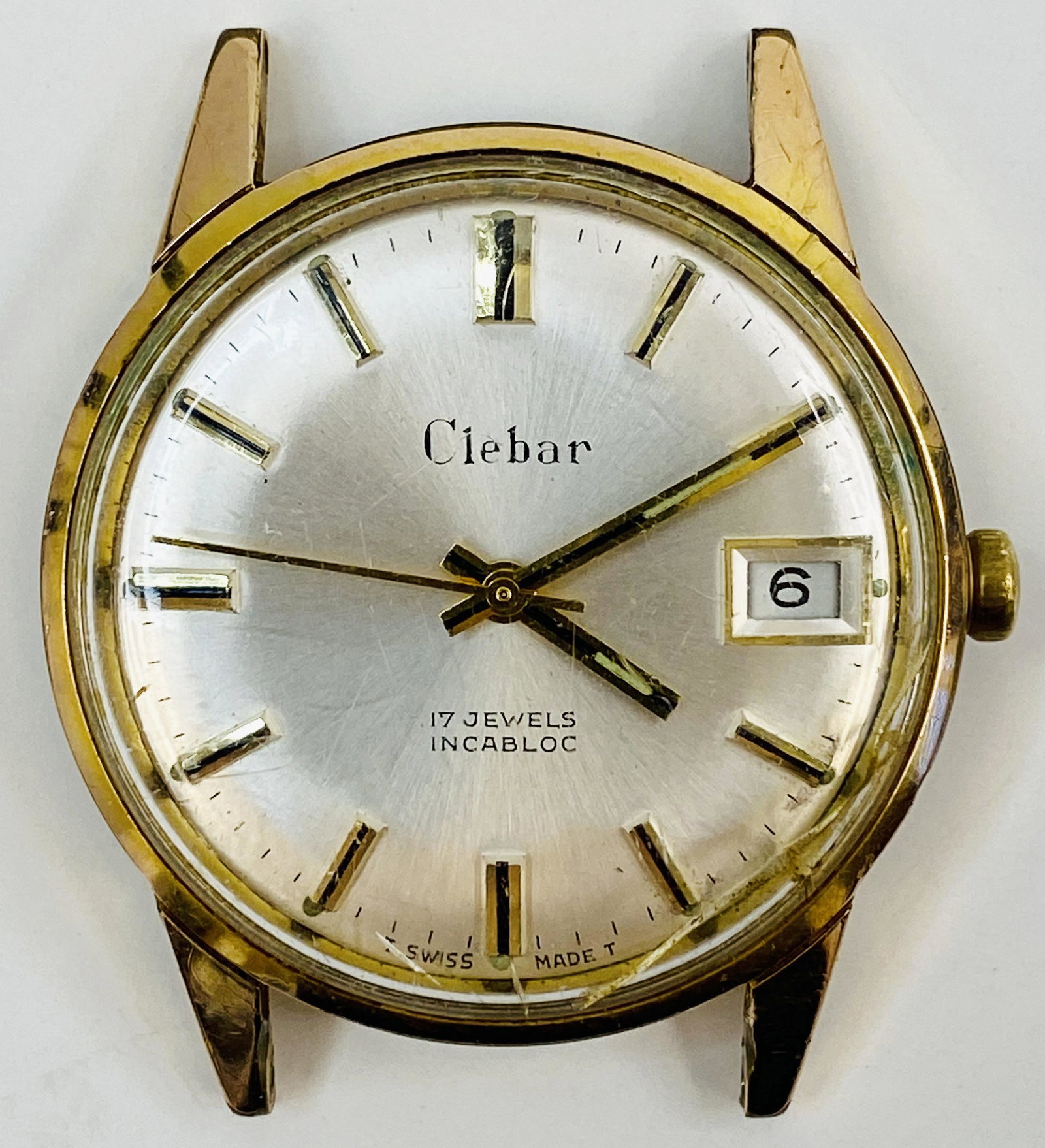 VINTAGE CLEBAR GOLD FILLED WIND-UP MENS WATCH: VINTAGE CLEBAR GOLD FILLED WIND-UP MENS WATCH The watch is pre-owned and doesn't run. Diameter: 34 mm *We can't garantee that the watch keeps accurate time, it wasn't tested long enough* SHIPPING FEE