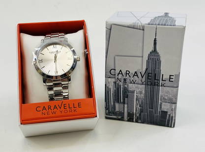 CARAVELLE NEW-YORK BATTERY MENS WATCH WITH BOX: CARAVELLE NEW-YORK BATTERY MENS WATCH WITH BOX  CONDITION: pre-owned and runs. Diameter: 40MM *We can't garantee that the watch keeps accurate time, it wasn't tested long enough* SHIPPING FEE CANADA 1