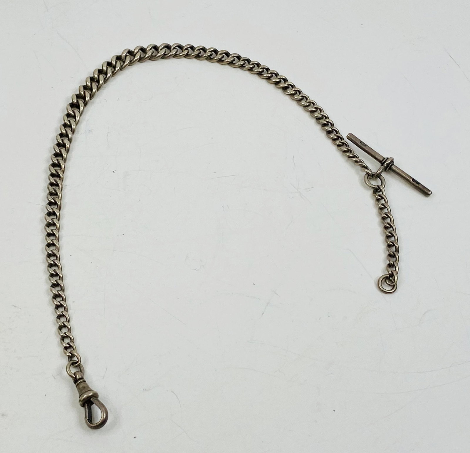 ANTIQUE STERLING SILVER POCKET WATCH CHAIN: ANTIQUE STERLING SILVER POCKET WATCH CHAIN CONDITION : PRE-OWNED SIZE: 12 INCHES LONG SHIPPING FEE CANADA 6.00$ USA 6.00$ Combined shipping is available for an extra fee, but only on items won on the
