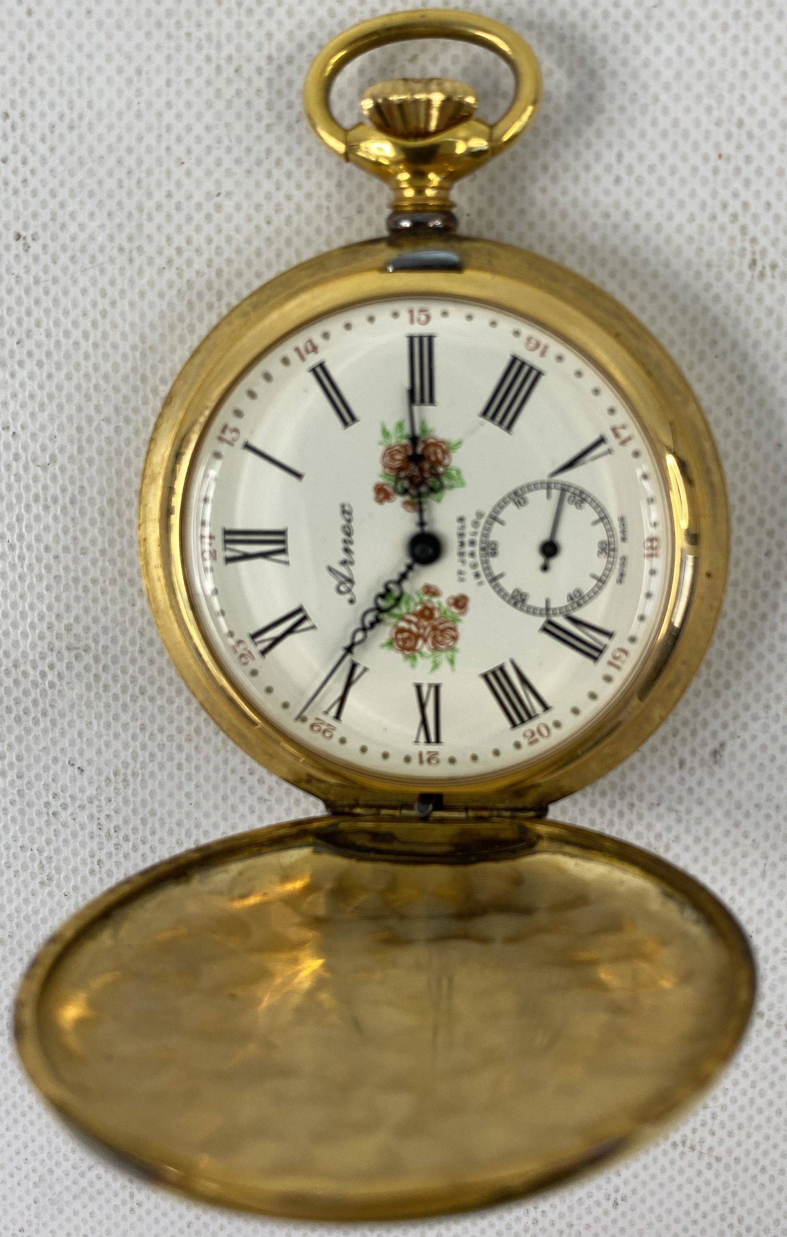 ANTIQUE ARNEX GOLD-FILLED 17 JEWELS POCKET WATCH: ANTIQUE ARNEX GOLD-FILLED 17 JEWELS POCKET WATCH CONDITION: PRE-OWNED, RUN Diameter: 2 inch *We can't garantee that the watch keeps accurate time, it wasn't tested long enough* SHIPPING FEE CANADA 15.