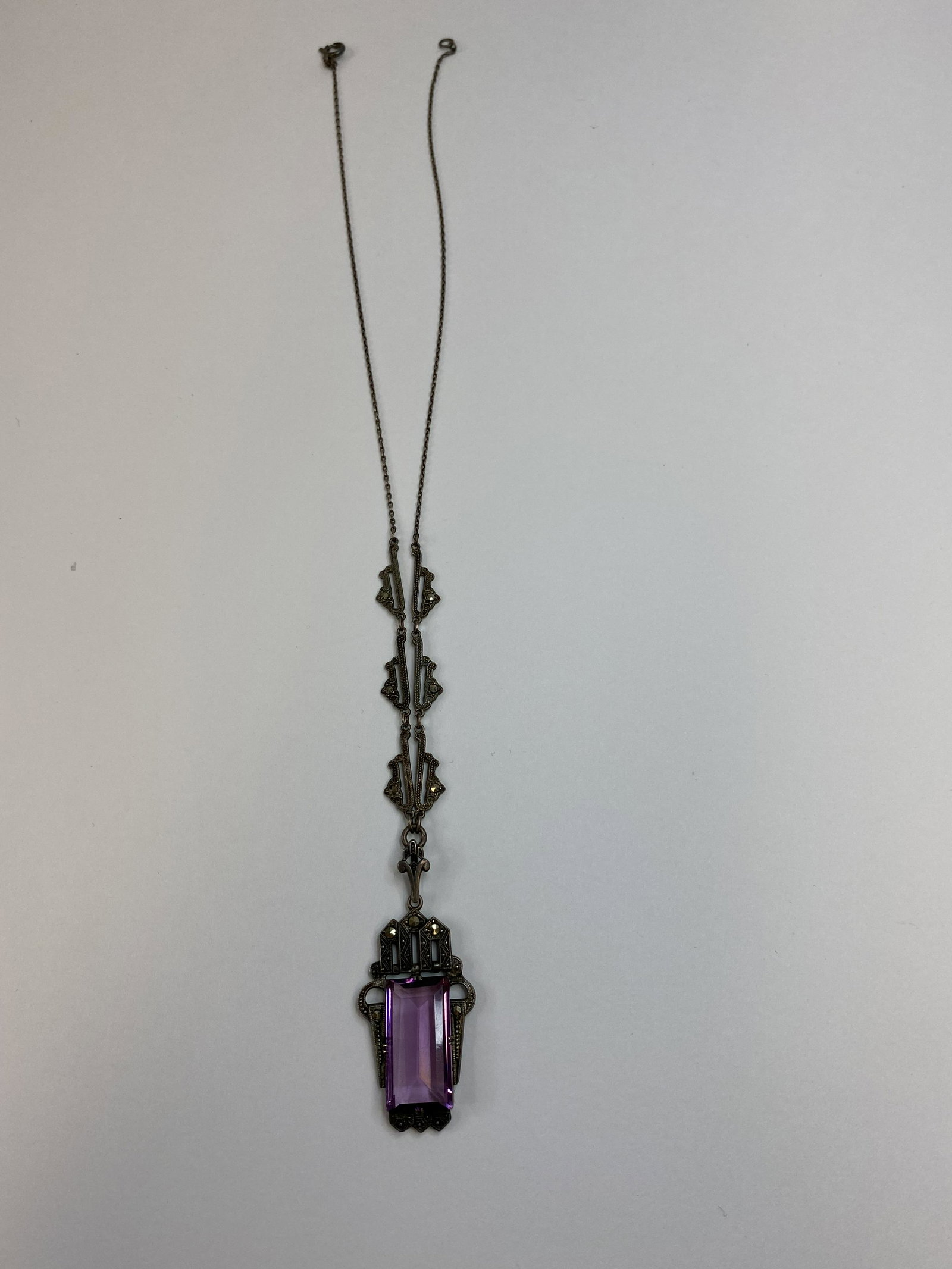 ANTIQUE STERLING SILVER MARCASITE NECKLACE PURPLE STONE: ANTIQUE STERLING SILVER MARCASITE NECKLACE PURPLE STONE CONDITION: PRE-OWNED SIZE : 19 INCHES WEIGHT : 11.1 GRAMS SHIPPING FEE CANADA 10.00$ USA 15.00$ Combined shipping is available for an extra fee,