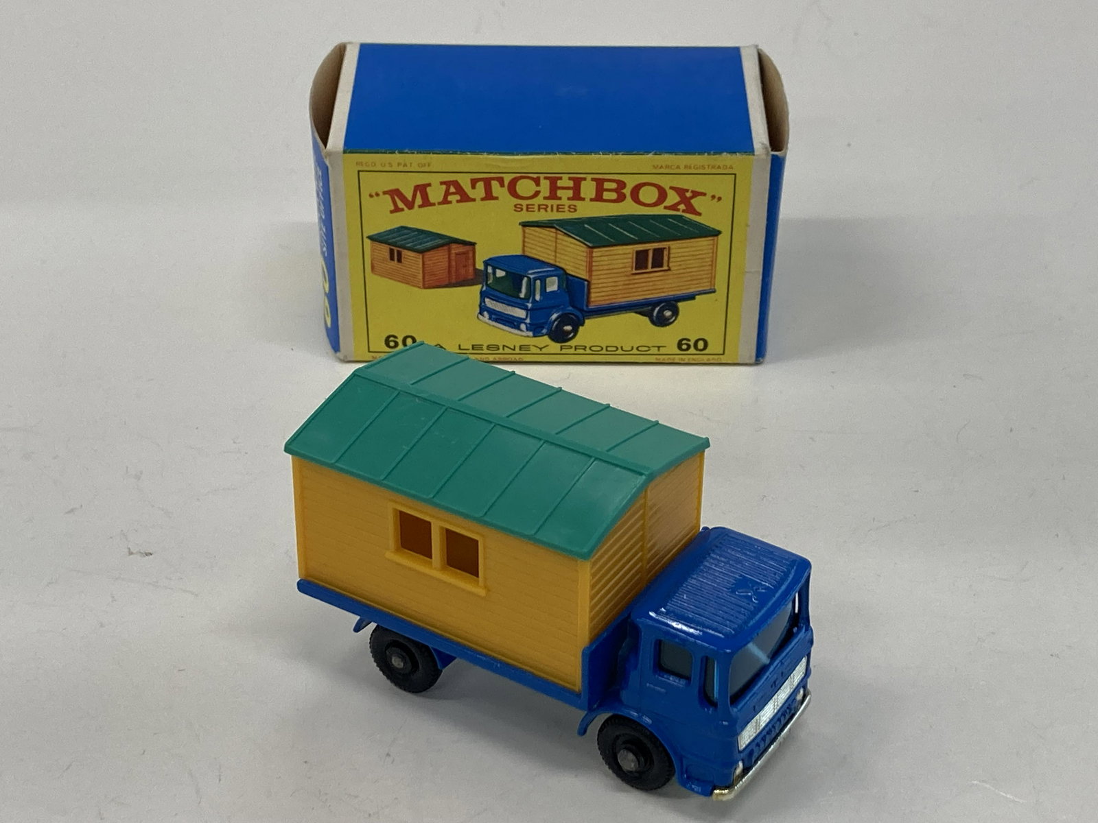 VINTAGE MATCHBOX TOYS TRUCK WITH SITE OFFICE #60 & BOX: VINTAGE MATCHBOX TOYS TRUCK WITH SITE OFFICE #60 & BOX CONDITION: PRE-OWNED SHIPPING FEE CANADA 10.00$ USA 15.00$ Combined shipping is available for an extra fee, but only on items won on the same da