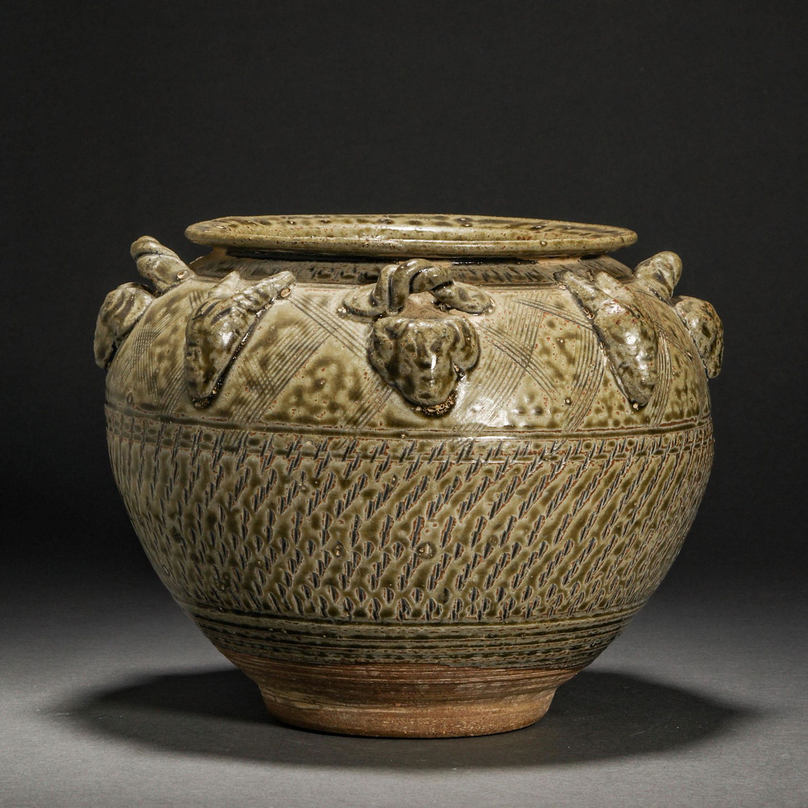 Tang Dynasty, Honey Colored Porcelain Beast Head Jar (1 of 12)