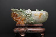 A CHINESE APPLE GREEN JADEITE OVAL BRUSH WASHER, Late Qing Dynasty (Woolley & Wallis)