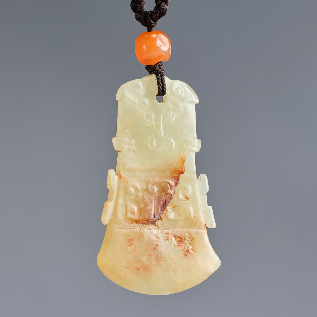 A Small Yellow Jade 'Archaistic Axe' Pendant, Qing Dynasty (Sotheby's Hongkong) (1 of 5)