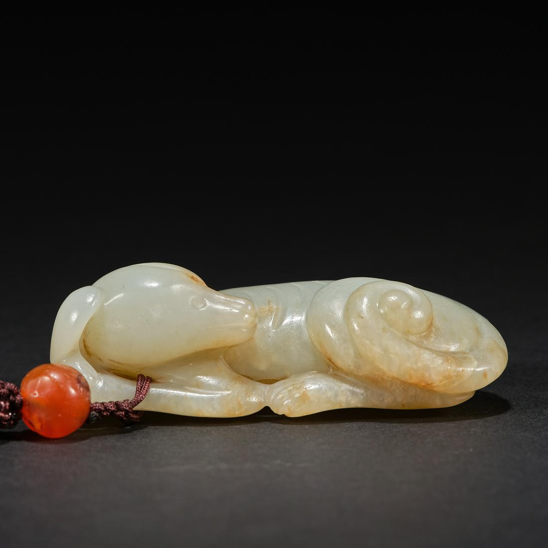 A Pale Celadon Jade Carving of a Dog, Qing Dynasty (Private English Collection) (1 of 7)