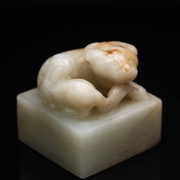 A White Jade 'buffalo and qilin' Seal, Qing Dynasty (Sotheby's London, The Dr Wou Kiuan