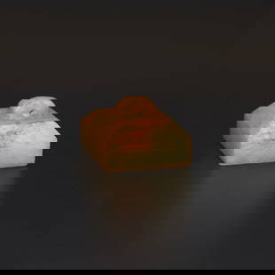 An archaic white jade square seal, Han Dynasty (private English collection): An archaic white jade square seal, Han Dynasty (private English collection) rising to a sloped and faceted finial drilled with a hole near the top, the seal face carved with two characters in zhuansh