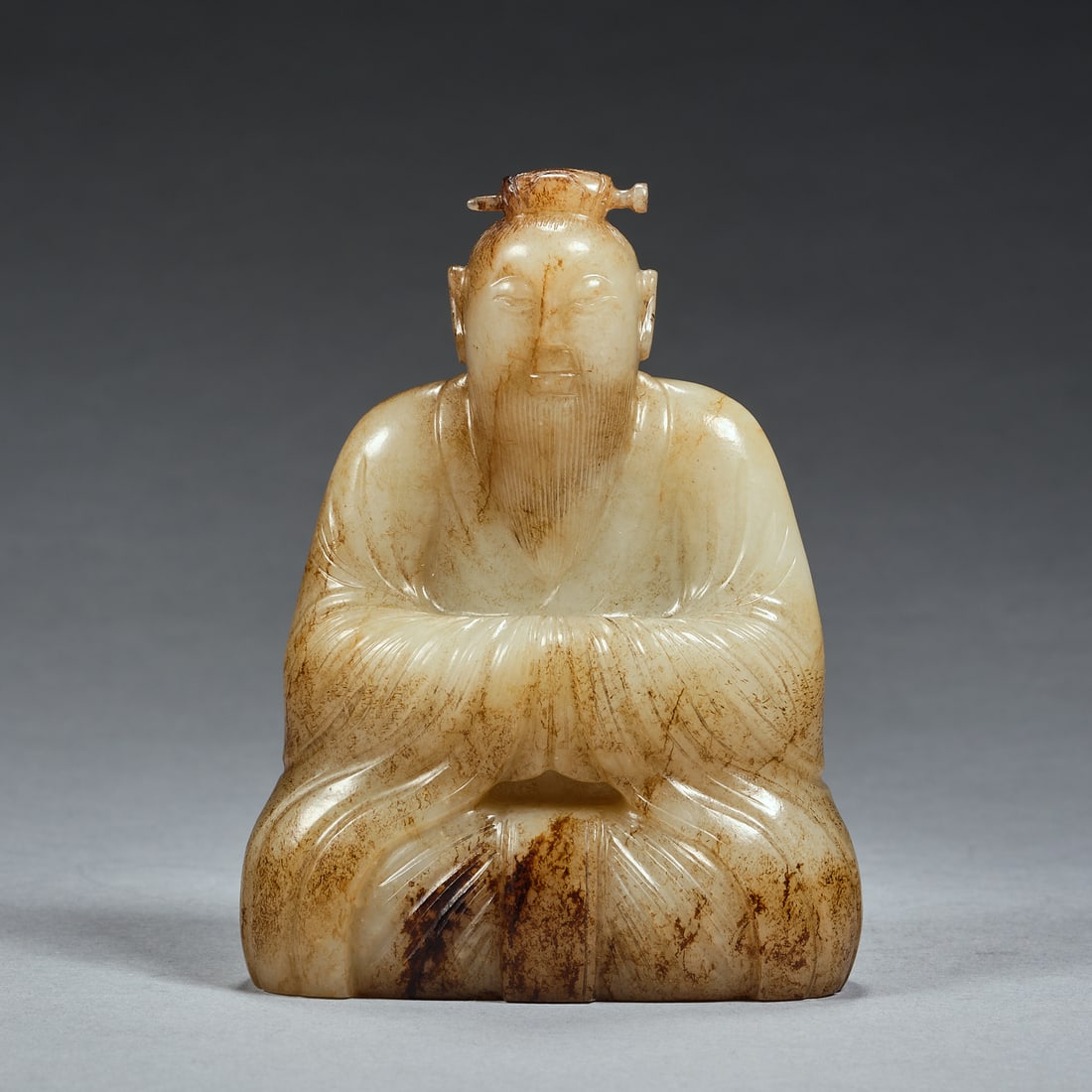 A pale celadon jade Daoist figural carving, Qing Dynasty (private English collection) (1 of 6)