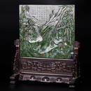 A large spinach jade table screen with wood stand, mid Qing Dynasty (a countryside house in Essex