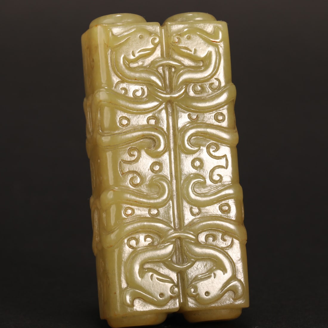 A yellow jade double tubular bead, Qing Dynasty (private English collection) (1 of 9)