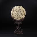 A fine white jade circular table screen, wood stand, Qing Dynasty