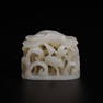 A white jade 'lotus and egret' hat finial, Qing Dynasty (private English collection)