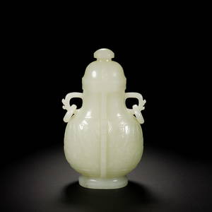 A white jade archaistic vase and cover, Qing Dynasty (London private collector)