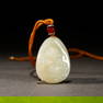A white jade Maitreya Buddha pendant, Qing Dynasty (London private collector)