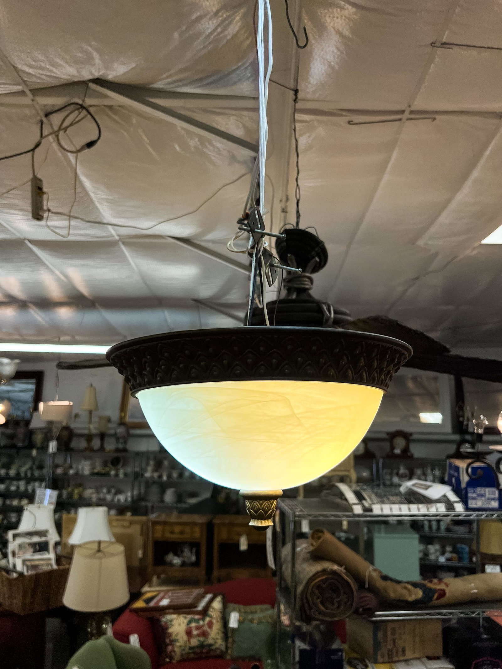 Alabaster Glass Demilune Chandelier: A 2-light alabaster glass chandelier with composite trim and finneal.