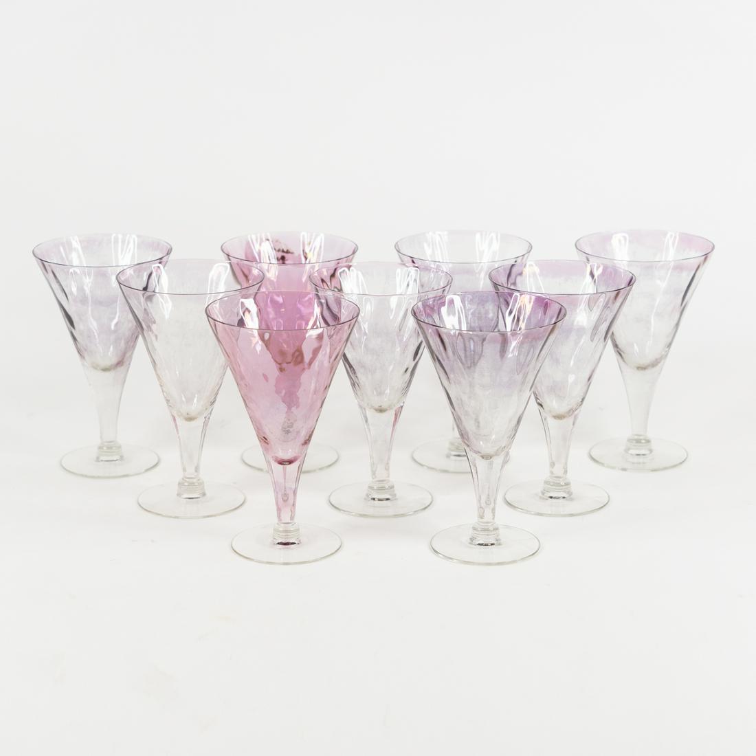 (9) Stemmed Flared Wine Glasses: A set of 9 wine glasses having flared tops, tapered stems, purple tinted glass.