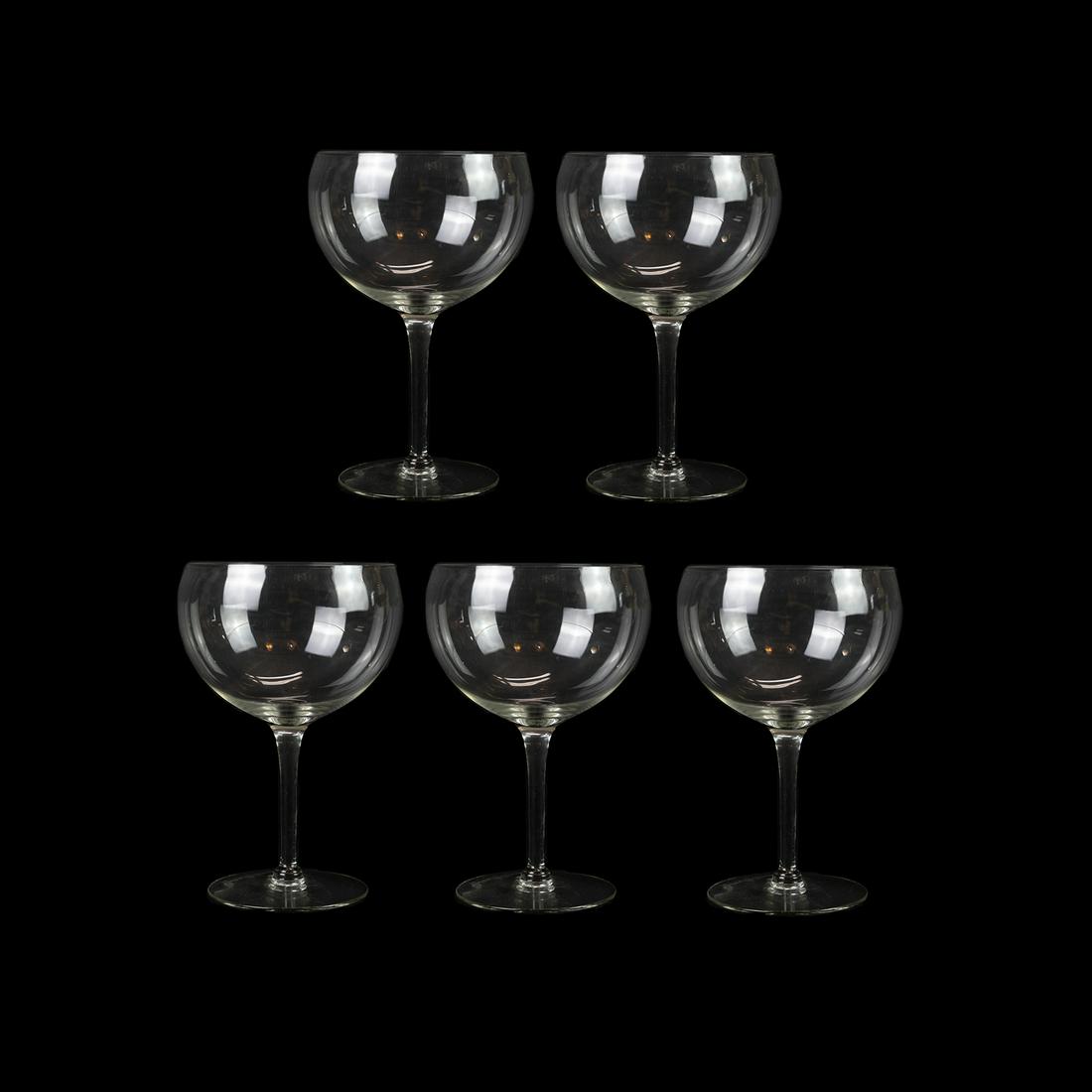 (5) Large Stemmed Wine Glasses: A set of 5 large stemmed wine glasses.