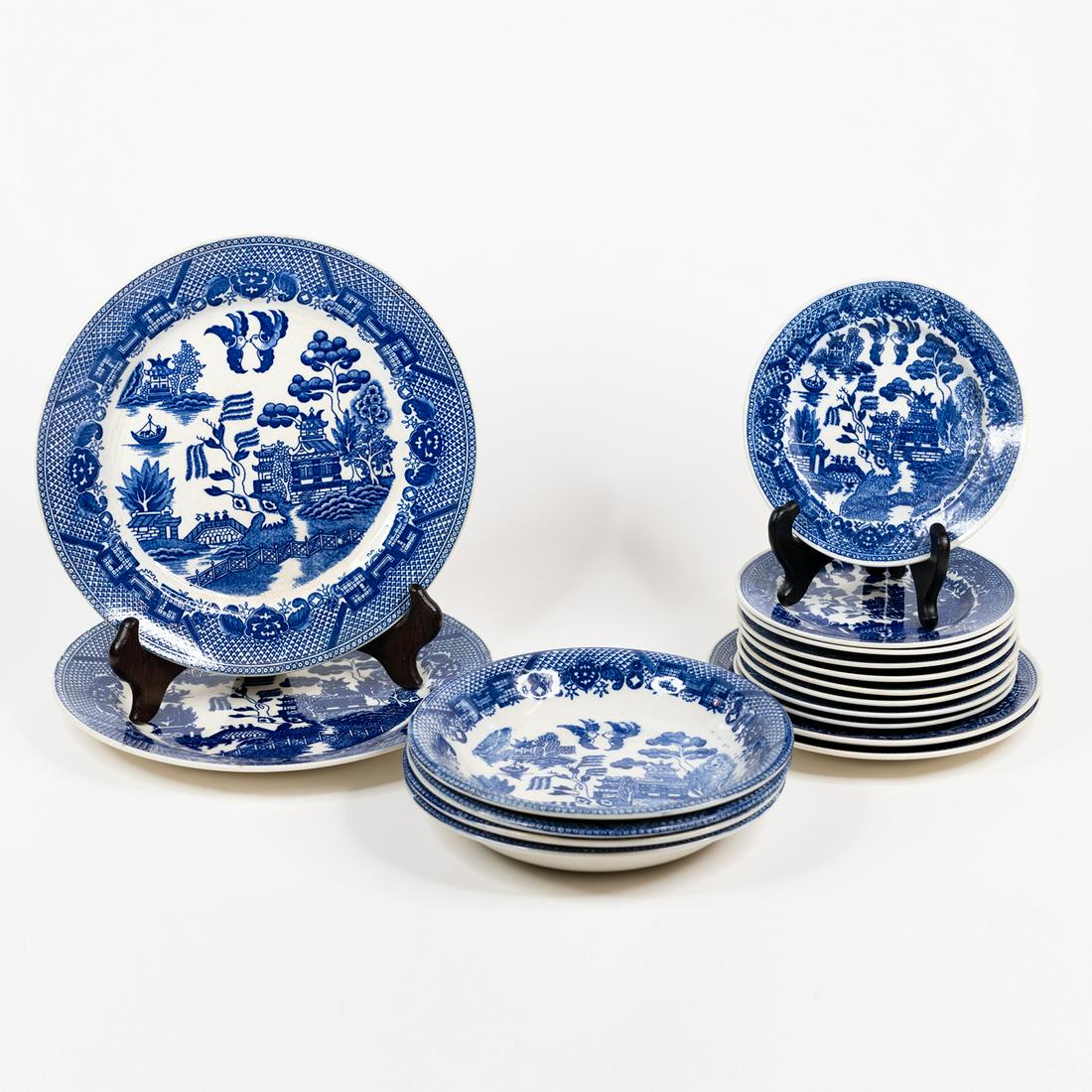 (17) Japanese Dinner, Side, Salad Plates: A set of 17 ceramic cobalt blue Japanese plates including 2 dinner plates, 9 side plates, 2 salad plates, 4 shallow bowls. Marked 'Japan' on the underside.