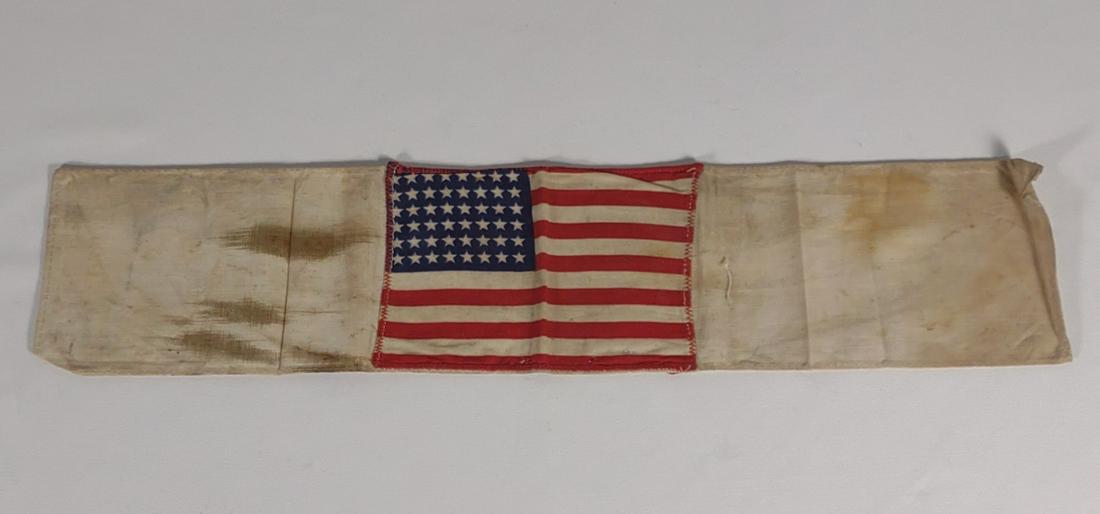U.S. WWII Invasion 48 Star American Flag Armband: WW2 Invasion 48 star US American flag armband. Appears to have original white thread stitching with reinforced red thread stitches.