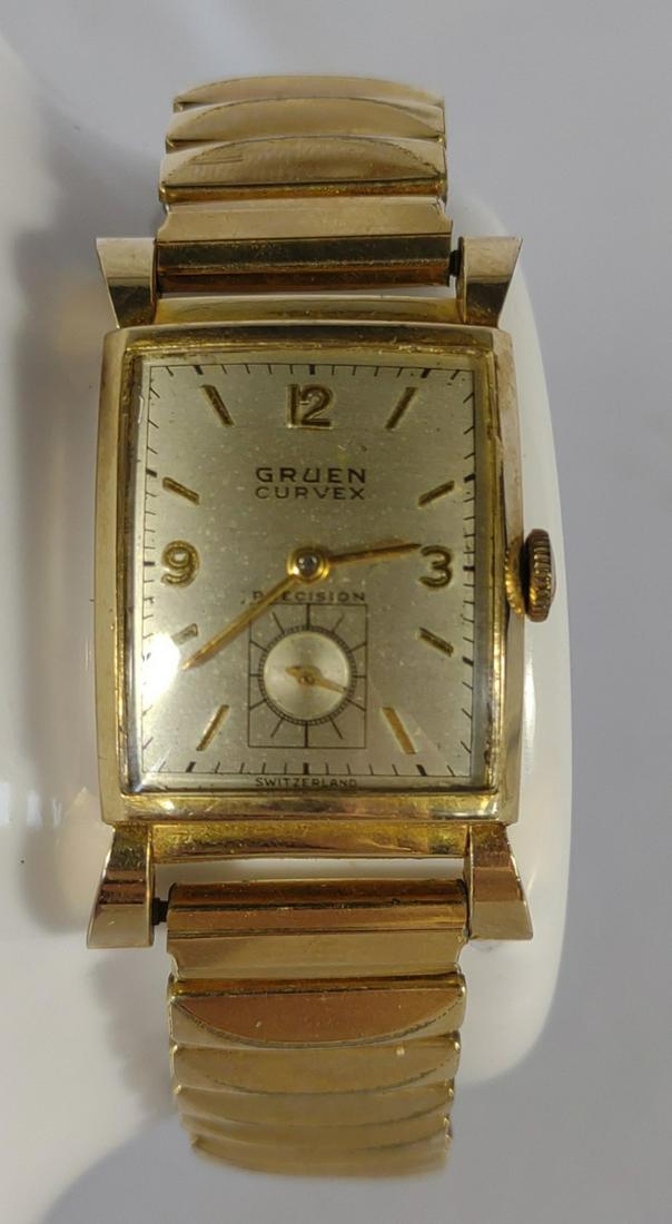 Gruen Curvex Precision 10K GF Mens Wrist Watch: Vintage Gruen Curvex Precision 10K golf filled mens watch. In working, running condition. A few surface scratches on band. Gold fill is not worn down. Good condition overall.
