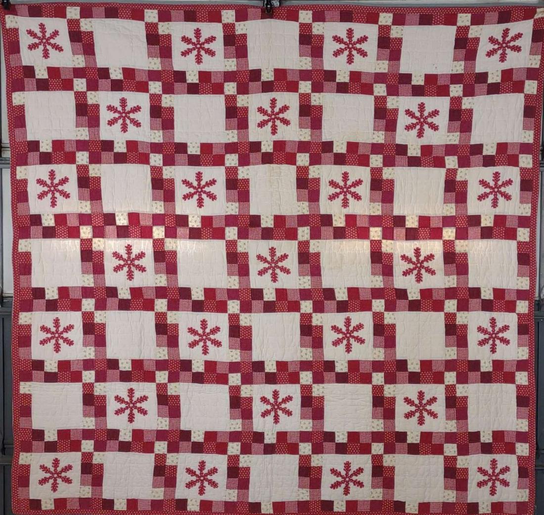 Vintage Hand Sewn Quilt w/ Snowflake Pattern: Red and white color. handsewn / handmade with snowflake pattern. A few minor stains, overall good.