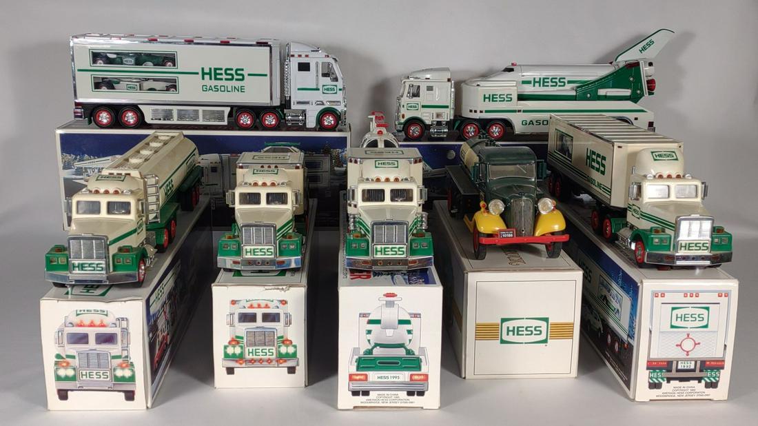 7 1990s Hess Truck Toys In Boxes: Dates include 1990, 1991, 1999, 1995, 1992, and 2003.
