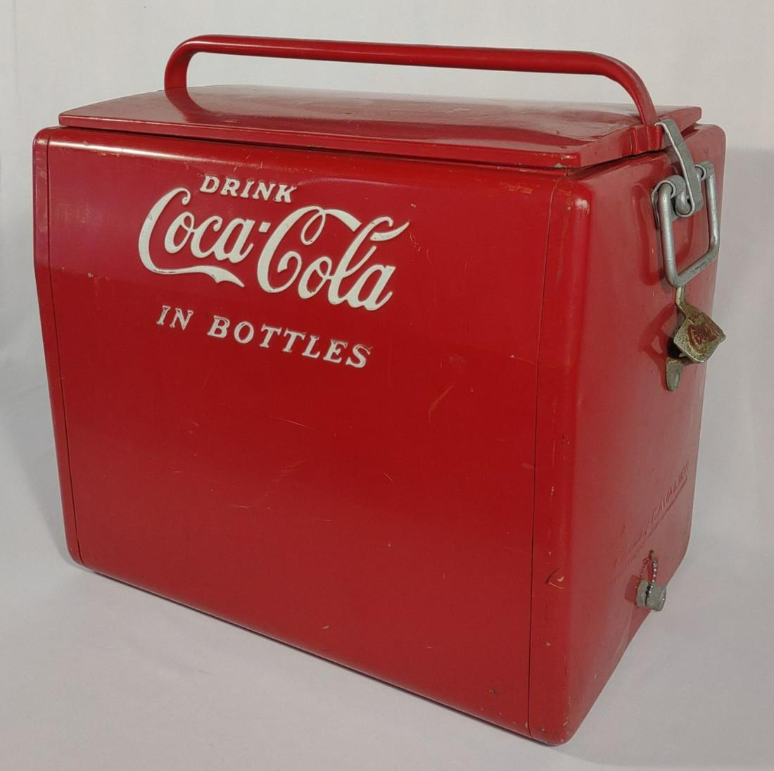 Vintage Coca Cola Cavalier Picnic Cooler w/ Tray: Circa 1940s. A few minor paint scratches. Overall paint is good and vibrant! Product of Cavalier, Chattanooga, Tennessee. No missing or broken parts. Tray is included with bottle opening and drain plu