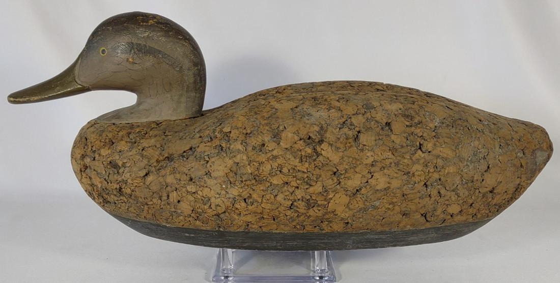 R. Madison Mitchell Carved Cork Black Duck Decoy: R. Madison Mitchell (MD, 1901-1993). Signed "R. Madison Mitchell, Havre de Grace, MD, 1948." Signature present on underside. Cork body with wood carved base and head. Head is loose.